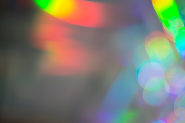 Rainbow holographic bokeh background Multicolored overflows of color