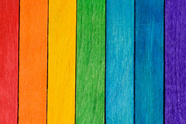 Rainbow LGBT pride flag crafted from painted wooden boards