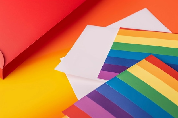 A rainbow paper that is on a colorful background