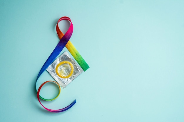 Photo rainbow ribbon awareness. lgbt community. world aids day. symbolic concept for raising awareness campaign on people with hiv concept