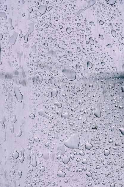 raindrops on the metallic surface, abstract background