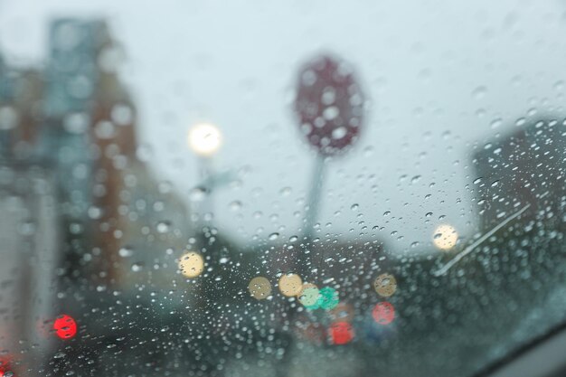 Raindrops on windowpane during a rainy day capturing the tranquility and melancholy of nature's tea