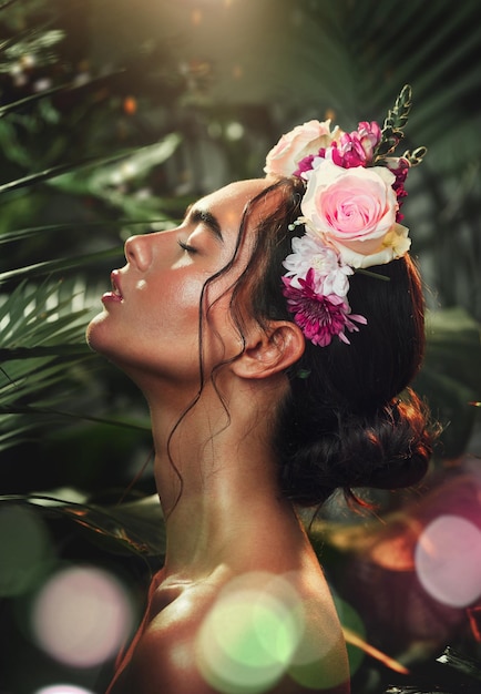 Photo rainforest skincare and beauty girl with flower accessory crown for tropical cosmetic with bokeh profile natural jungle and wellness model woman with roses for floral cosmetics advertising