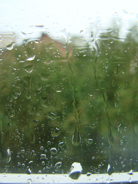 Rainy days rain drops on the window surface