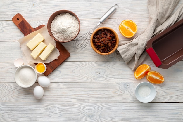 Raisin pie making process with ingredients, flat lay