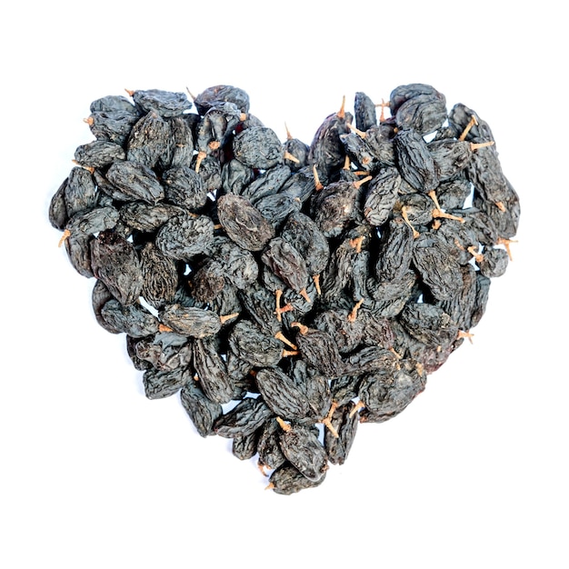 Raisins laid out in a heart shape Isolated