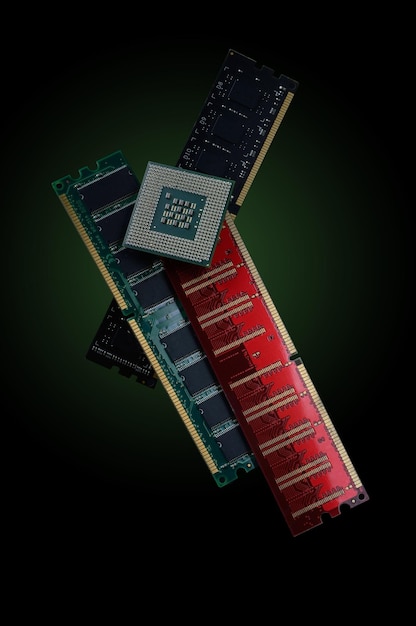 RAM modules and processor on a dark background closeup