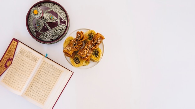 Ramadan composition with quran and arab food