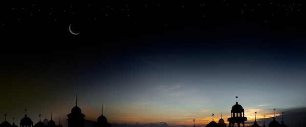 Ramadan kareem religion symbols. Mosques Dome in twilight night with Crescent Moon and sky dark black background. for eid al-fitr, arabic, Eid al-adha, new year muharram concept. panorama free space.