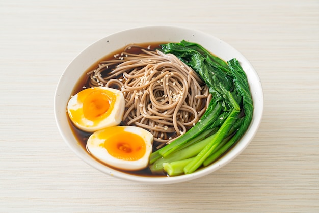 ramen noodles with egg and vegetable - vegan or vegetarian food style