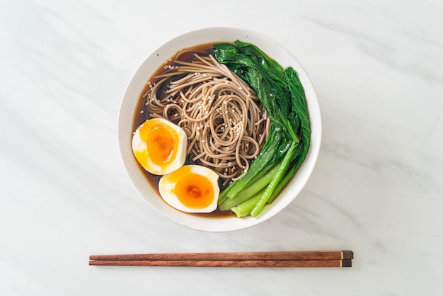 ramen noodles with egg and vegetable - vegan or vegetarian food style