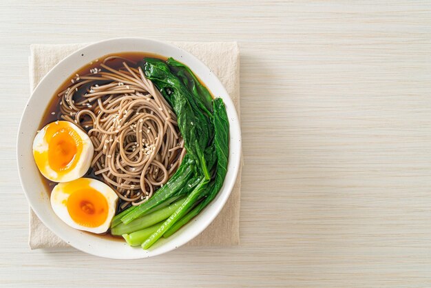 ramen noodles with egg and vegetable - vegan or vegetarian food style