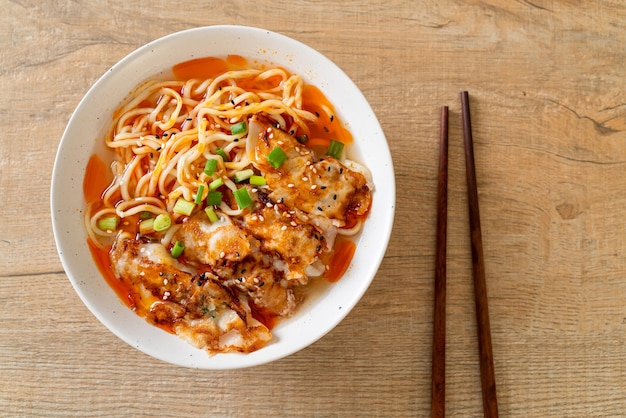 ramen noodles with gyoza or pork dumplings. Asian food style