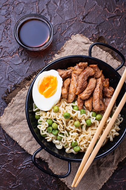 Ramen noodles with meat, vegetables and egg