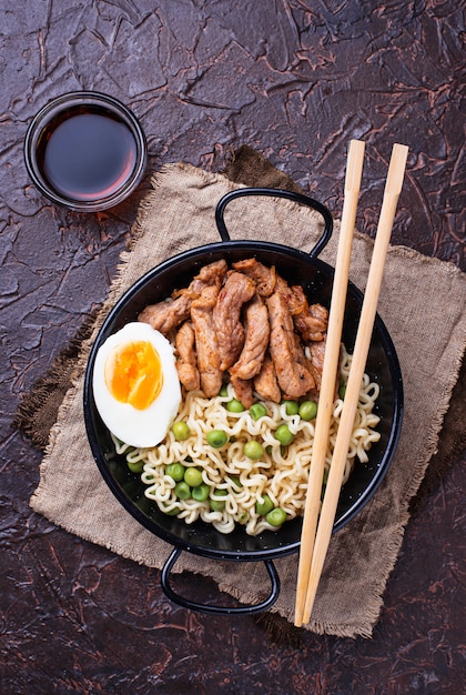 Ramen noodles with meat, vegetables and egg