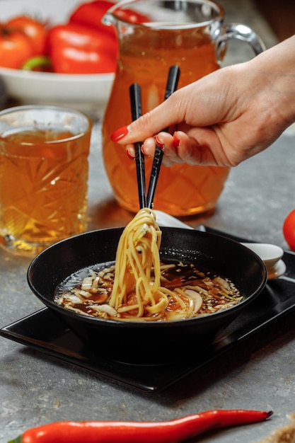 Ramen with chicken and pork SHOYU RAMEN chicken and pork with noodles