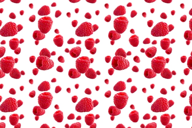 Raspberries abstract background fruit pattern of colorful wild berries isolated on white background