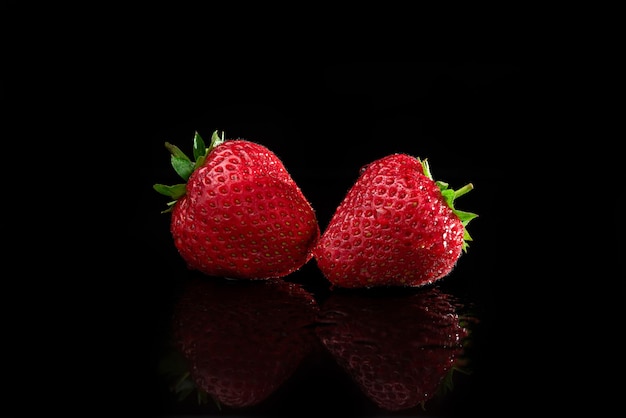 Raspberries on black isolated