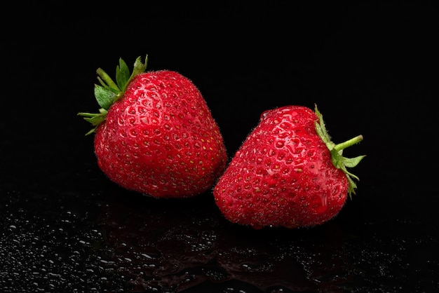 Raspberries on black isolated