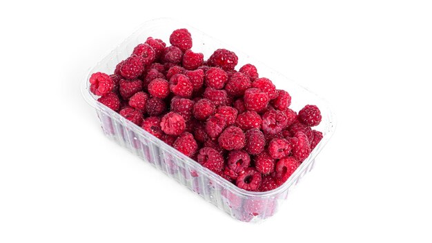 Raspberry isolated. Raspberries in plastic container