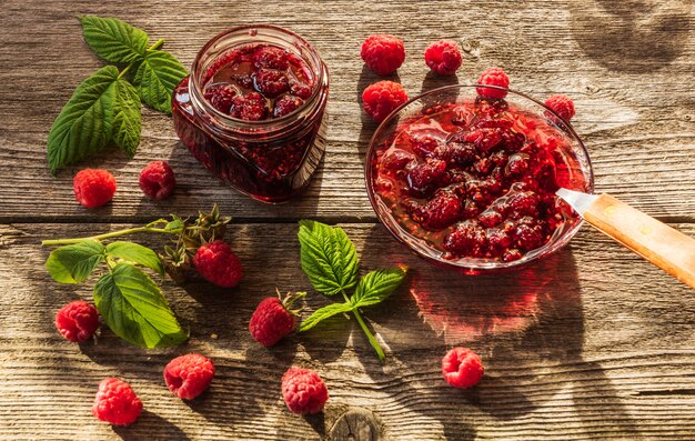 Raspberry jam in glass jars.