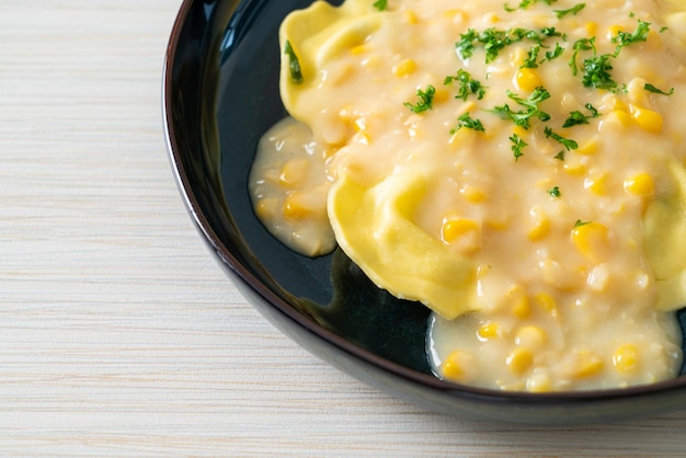 Ravioli pasta with corn cheese sauce