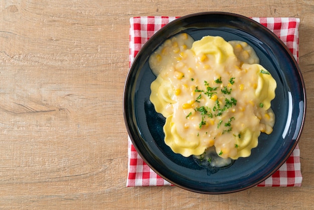 Ravioli pasta with corn cheese sauce