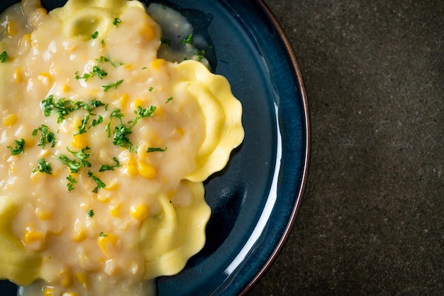 Ravioli pasta with corn cheese sauce