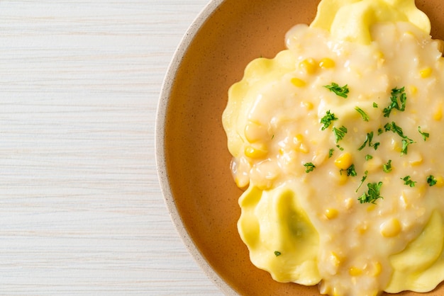 Ravioli pasta with corn cheese sauce