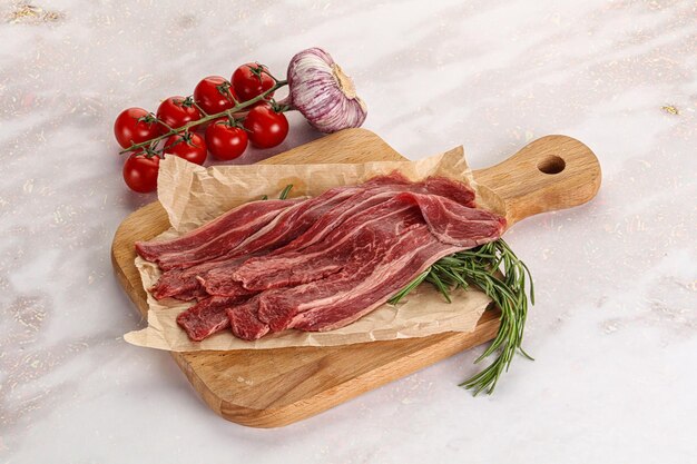 Raw beef bacon slices for cooking