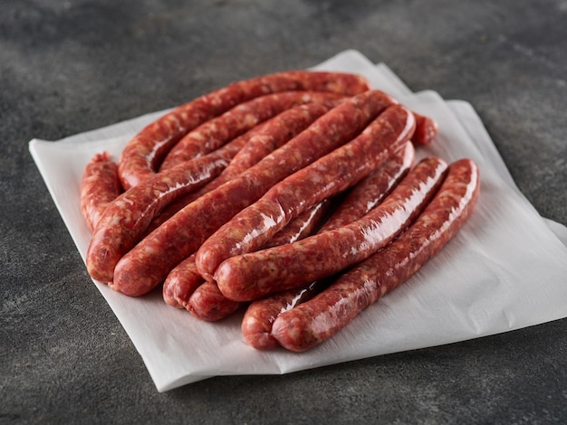 Raw Beef bratwurst German sausages Rinderbratwurst Fresh raw beef sausages Close up