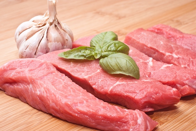 Raw beef on cutting board