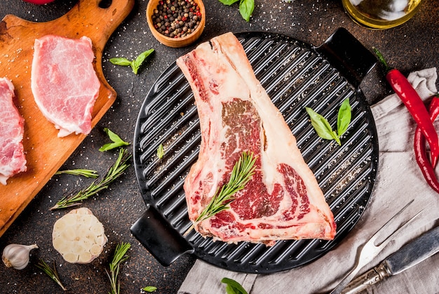 Raw beef marbled meat on grill pan