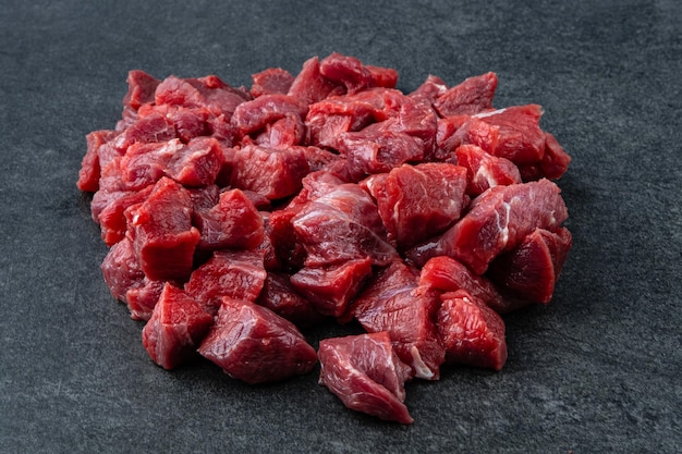 Raw beef meat on stone cutting board