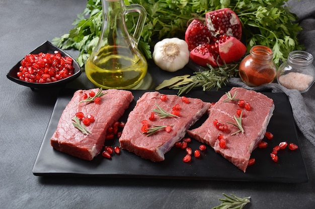 Raw beef slices with herbs and spices