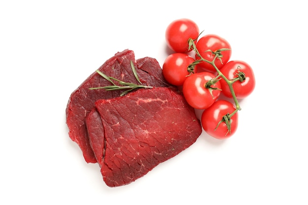 Raw beef steaks with tomatoes isolated on white background