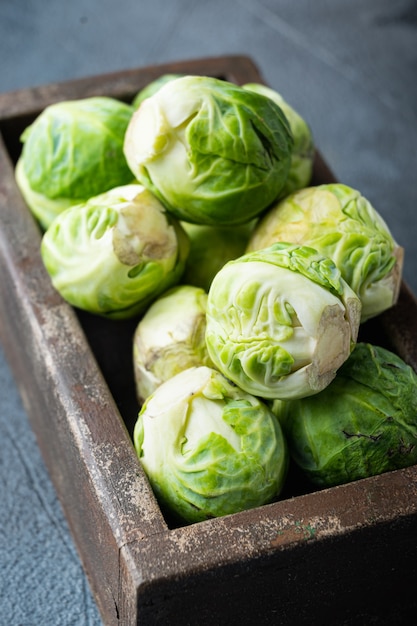 Raw brussels sprouts, on  grey background