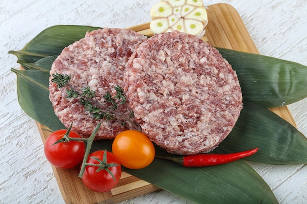 Raw burger cutlet