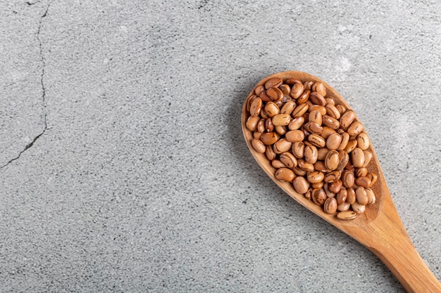 Raw carioca beans on the table