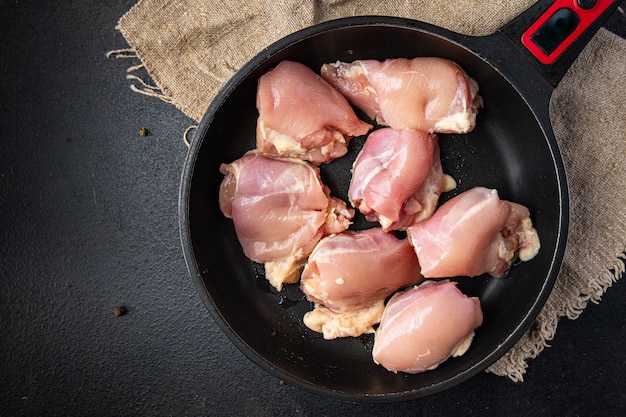 raw chicken or turkey skinless meat thigh boneless pulp poultry fresh meal snack on the table