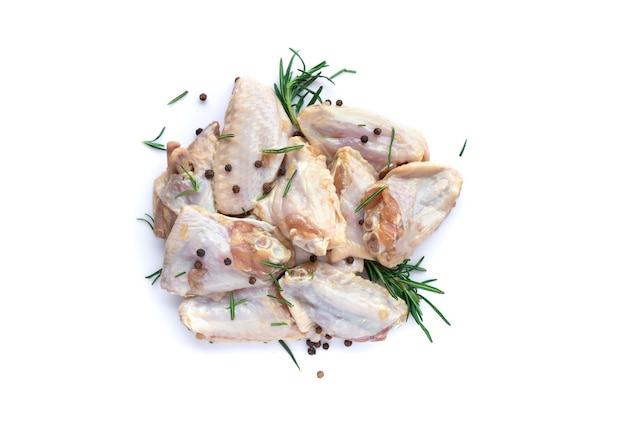 Raw chicken wings with garlic pepperand rosemary isolated