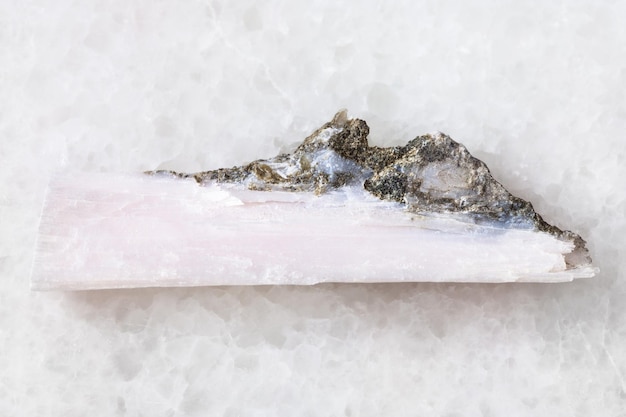 Raw crystal of xonotlite gemstone on white