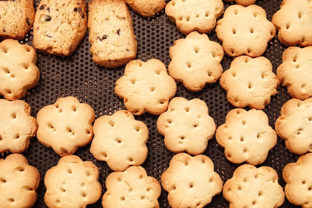 Raw dough Yellow cookies buttons on sheet pan Cooking