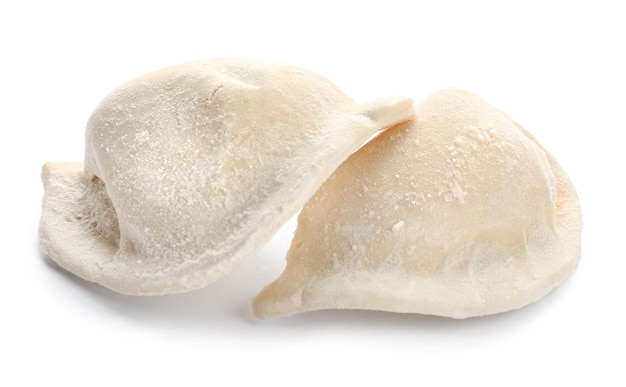 Raw dumplings on white background