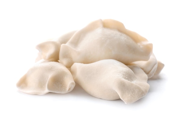 Raw dumplings on white background