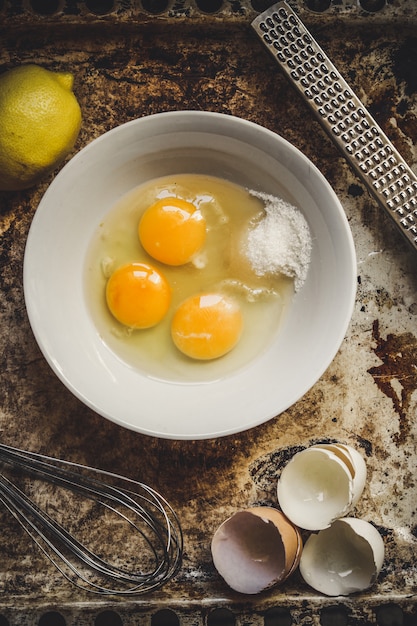 Raw eggs in a plate