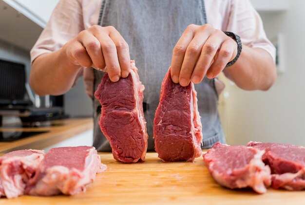 Raw fillet beef meat for steaks on the home electric grill