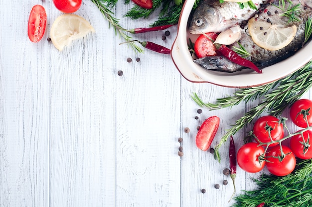 Raw fish cooking and ingredients.