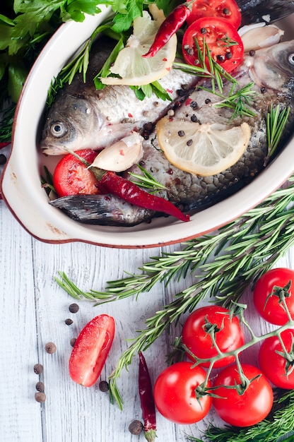 Raw fish cooking and ingredients.