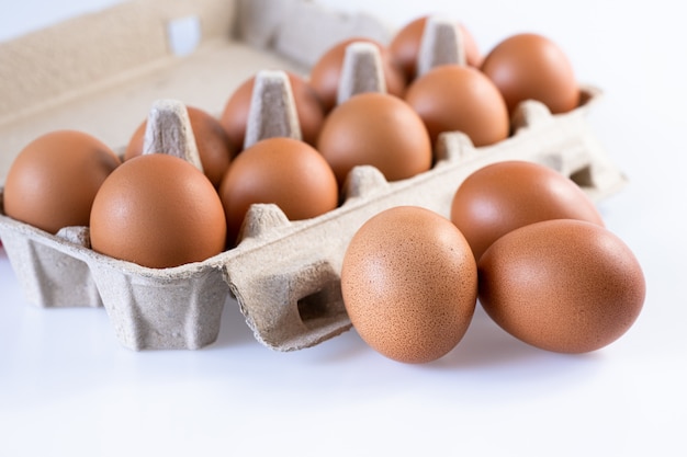 Raw fresh eggs in carton box